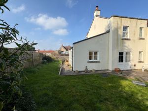 Side and rear garden- click for photo gallery